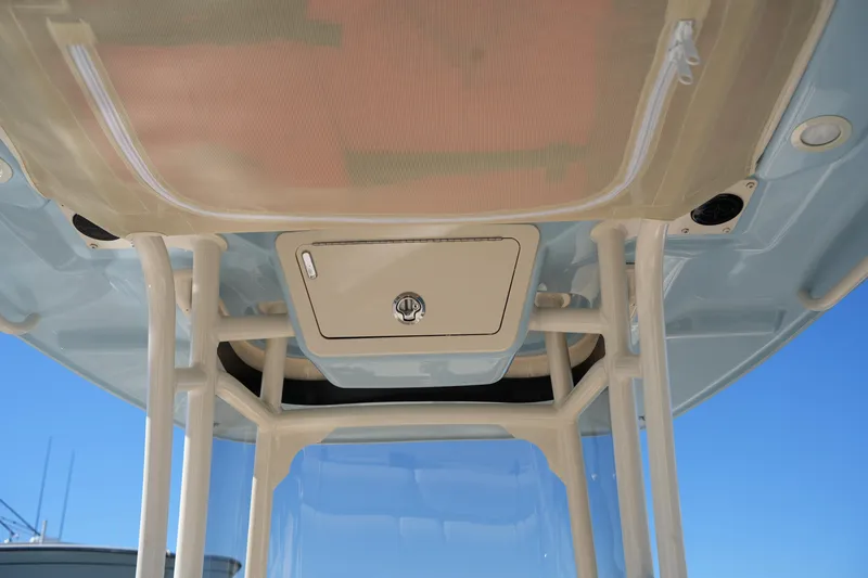 Slide: The Image of 2024 Grady-White Fisherman 236 boat console with storage compartment and sturdy framework. - 31