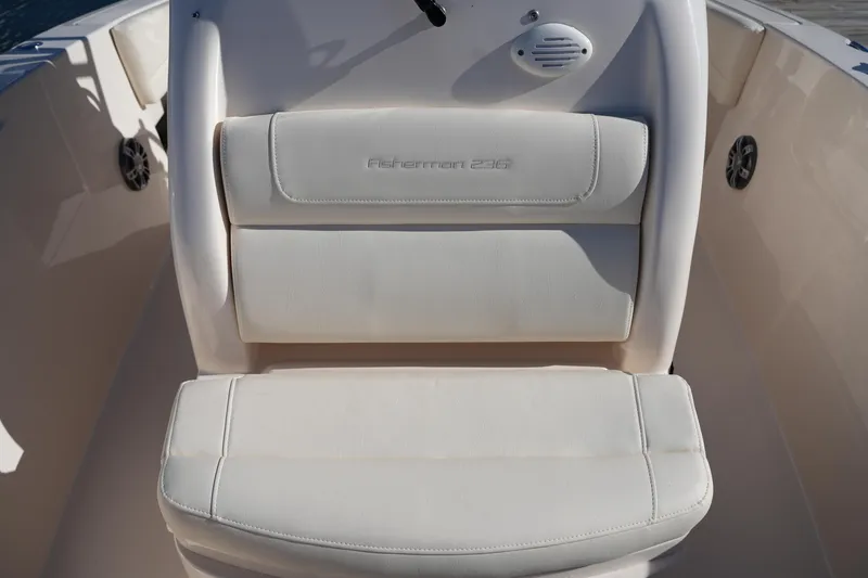 Slide: The Image of 2024 Grady-White Fisherman 236 boat seat, white upholstery, sleek design. - 36