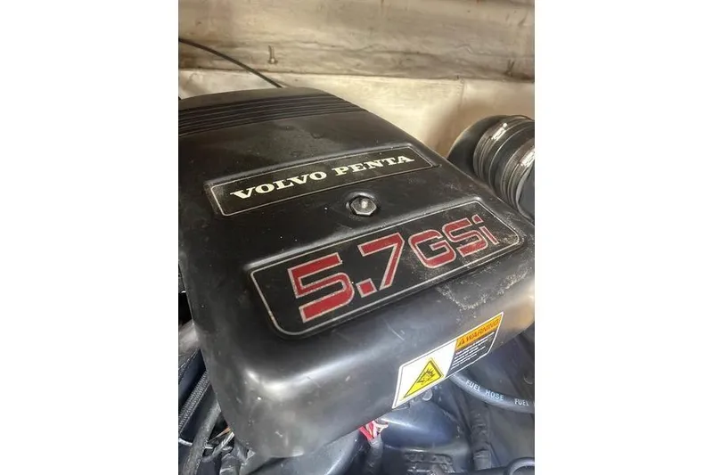 Slide: The Image of Volvo Penta 5.7 GSi engine in 2000 Larson Cabrio 330 Mid Cabin boat. - 38