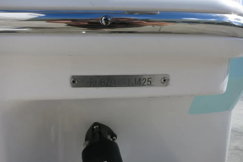 Slide: The Image of 2025 Robalo R250 Center Console boat hull identification number plate. - 11