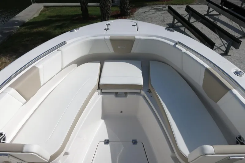 Slide: The Image of 2025 Robalo R250 Center Console boat with spacious seating and sleek design. - 13