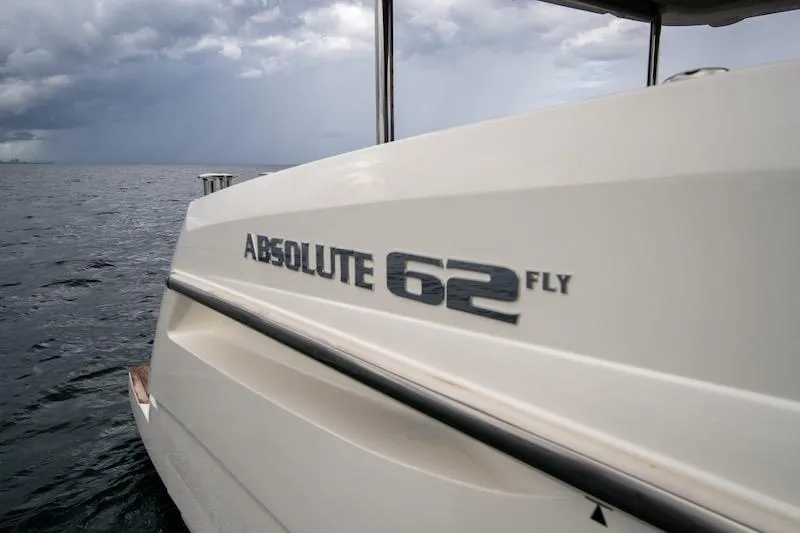 Slide: The Image of 2023 Absolute 62 Fly yacht on open sea under cloudy sky. - 30