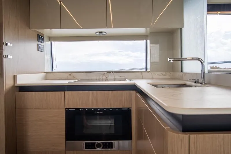 Slide: The Image of Modern kitchen interior of 2023 Absolute 62 Fly yacht with sleek cabinetry and appliances. - 48