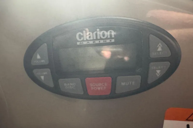 Slide: The Image of Clarion Marine audio control panel on 2004 Four Winns 268 Vista boat. - 23