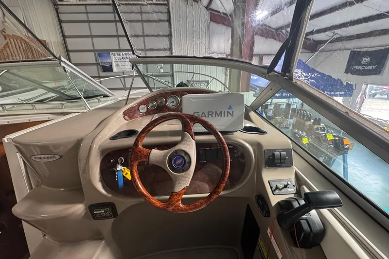 Slide: The Image of 2004 Four Winns 268 Vista boat dashboard with Garmin navigation system. - 5