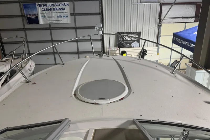 Slide: The Image of 2004 Four Winns 268 Vista boat in a Wisconsin marina showroom. - 8