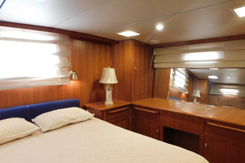 Slide: The Image of Luxurious cabin interior of 1995 Jefferson 52 Riviana Cockpit MY yacht with wood paneling. - 15