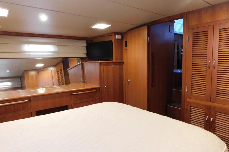 Slide: The Image of Luxurious wooden interior of 1995 Jefferson 52 Riviana Cockpit MY yacht cabin. - 17