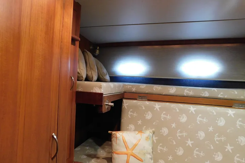 Slide: The Image of Cozy cabin interior of 1995 Jefferson 52 Riviana Cockpit MY with nautical-themed decor. - 25