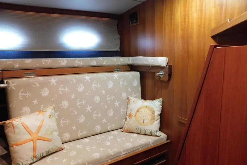 Slide: The Image of Interior of 1995 Jefferson 52 Riviana Cockpit MY with nautical-themed cushions. - 26