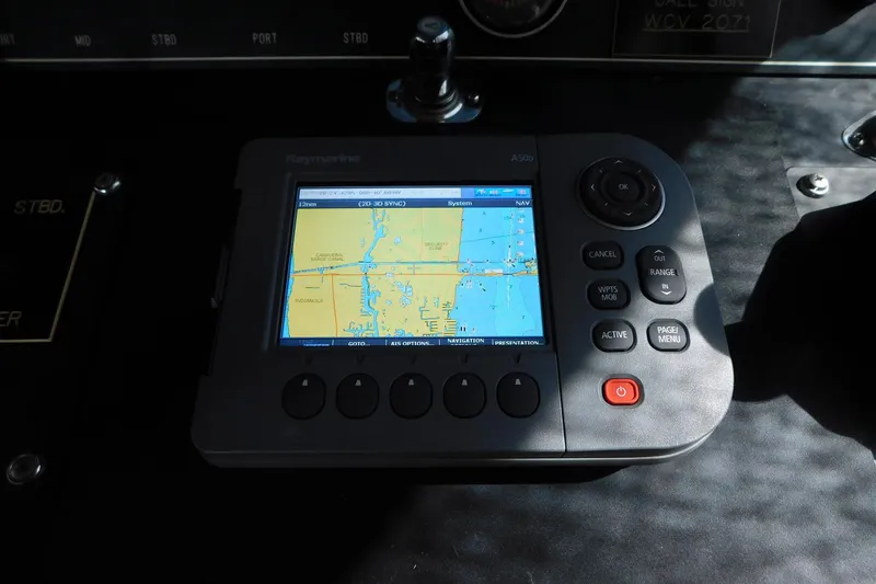 Slide: The Image of Navigation system on 1995 Jefferson 52 Riviana Cockpit MY boat dashboard. - 32