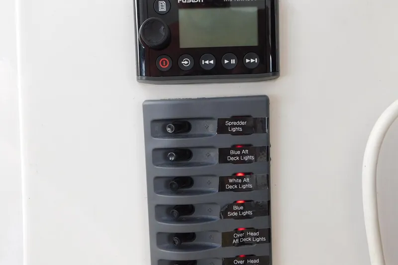 Slide: The Image of Control panel with switches for deck lights on a 1995 Jefferson 52 Riviana Cockpit MY. - 33