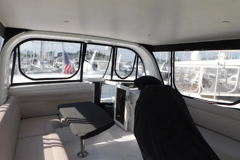 Slide: The Image of Interior of 1995 Jefferson 52 Riviana Cockpit MY yacht with seating and table. - 39