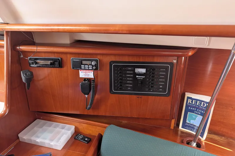 Slide: The Image of Control panel of a 2001 Beneteau Oceanis 331 sailboat with navigation equipment. - 5