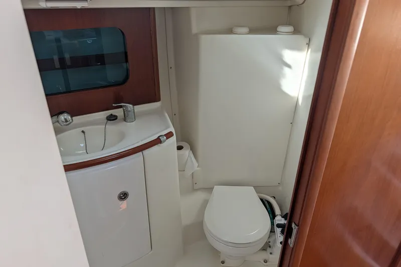 Slide: The Image of Bathroom interior of 2001 Beneteau Oceanis 331 sailboat, featuring sink and toilet. - 6