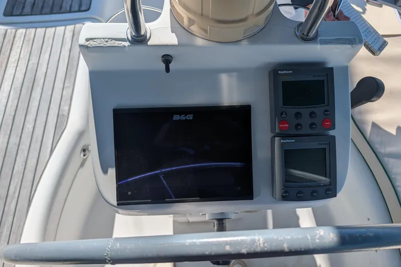 Slide: The Image of Steering console of 2001 Beneteau Oceanis 331 sailboat with navigation instruments. - 8