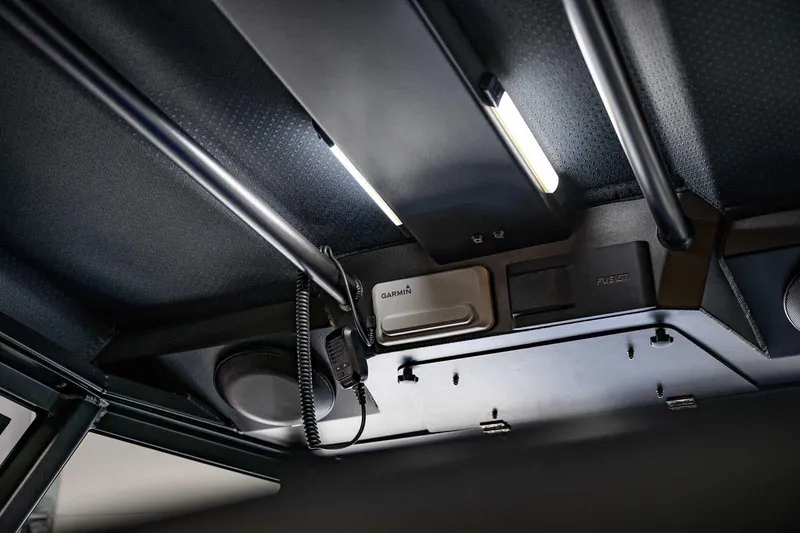 Slide: The Image of Interior view of 2024 StabiX 240UCC with mounted electronic devices and lighting. - 22