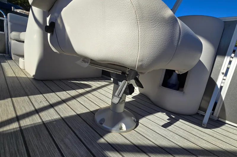 Slide: The Image of 2023 G3 Select 22RC boat seat on striped deck flooring. - 23