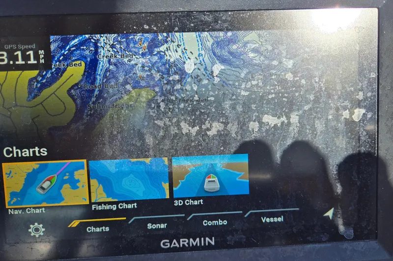 Slide: The Image of Garmin GPS display on 2023 G3 Select 22RC showing navigation and fishing charts. - 39