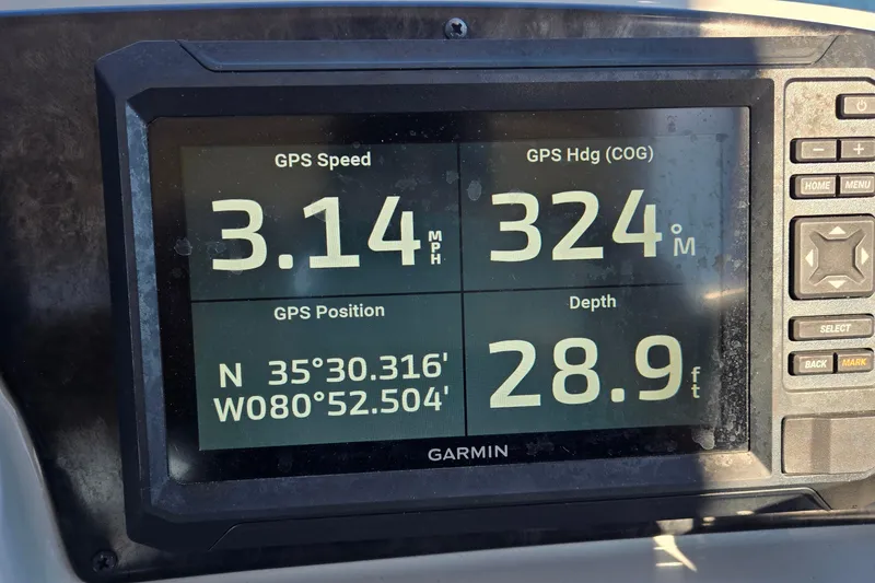 Slide: The Image of Garmin GPS display on 2023 G3 Select 22RC showing speed, heading, position, and depth. - 42
