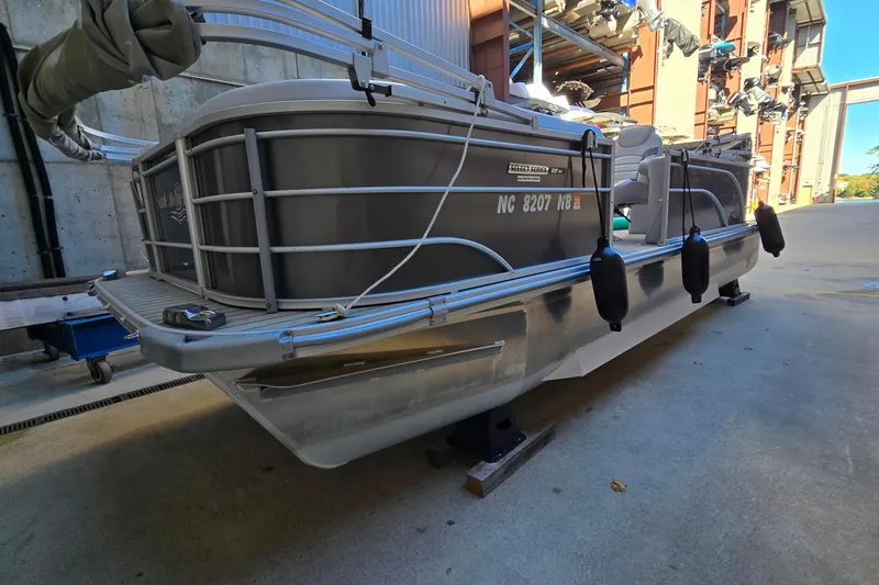 Slide: The Image of 2023 G3 Select 22RC pontoon boat on a concrete surface, side view. - 49