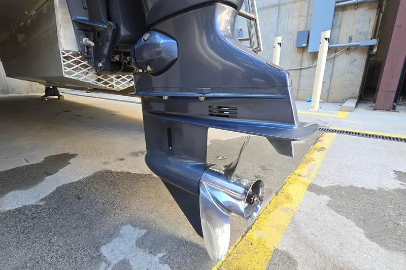 Slide: The Image of 2023 G3 Select 22RC boat motor and propeller close-up in a garage setting. - 51