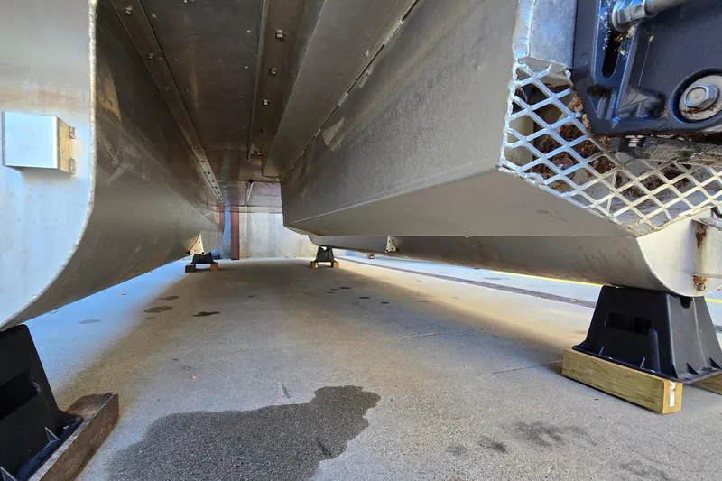 Slide: The Image of Underneath view of 2023 G3 Select 22RC pontoon boat on supports. - 52