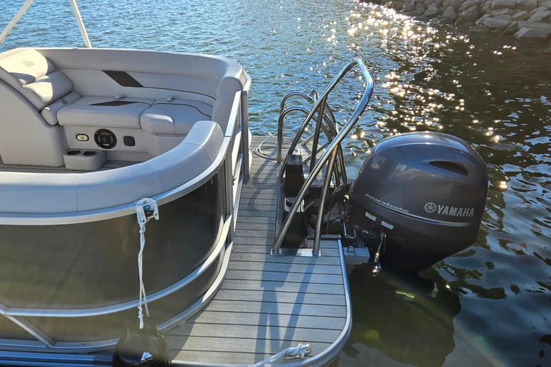 Slide: The Image of 2023 G3 Select 22RC pontoon boat with Yamaha motor on a sunny day. - 6