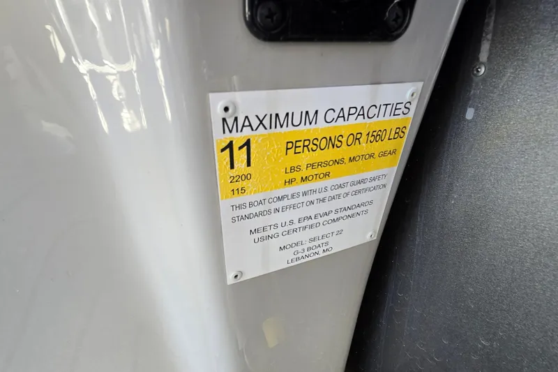 Slide: The Image of Capacity label on 2023 G3 Select 22RC boat, maximum 11 persons or 1560 lbs. - 65