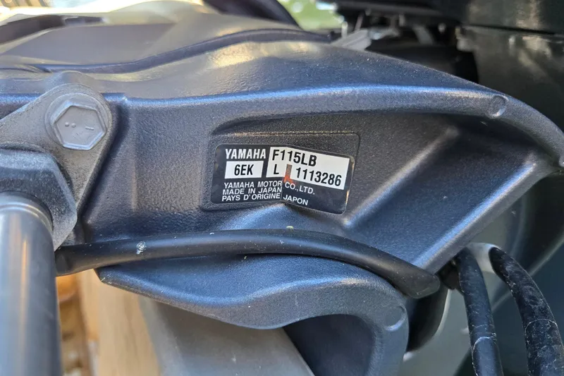 Slide: The Image of Close-up of Yamaha F115LB engine label on 2023 G3 Select 22RC boat. - 67