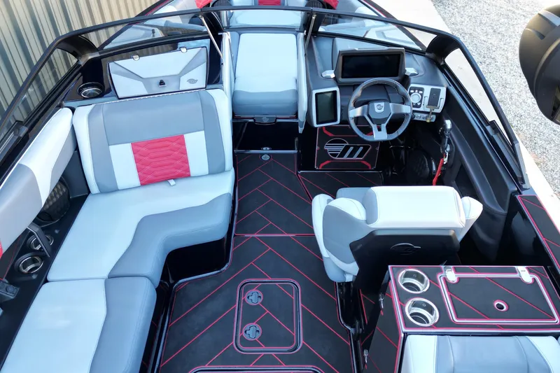 Slide: The Image of 2023 Malibu Wakesetter 25 LSV interior with modern design, featuring sleek seating and advanced dashboard. - 10