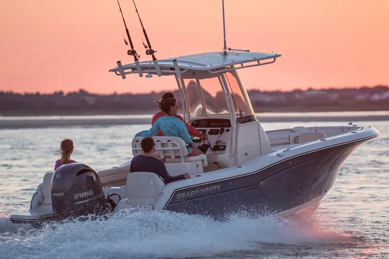Slide: The Image of Manufacturer Provided Image: 2018 Grady-White Fisherman 216 boat cruising on water with two people onboard. - 5