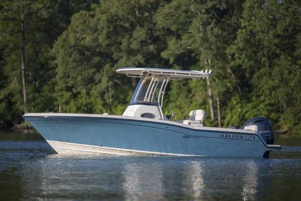 Slide: The Image of Manufacturer Provided Image: 2018 Grady-White Fisherman 216 boat cruising at sunset with passengers. - 6