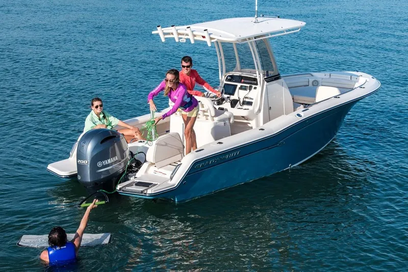 Slide: The Image of Manufacturer Provided Image: 2018 Grady-White Fisherman 216 boat on calm water with forest background. - 7