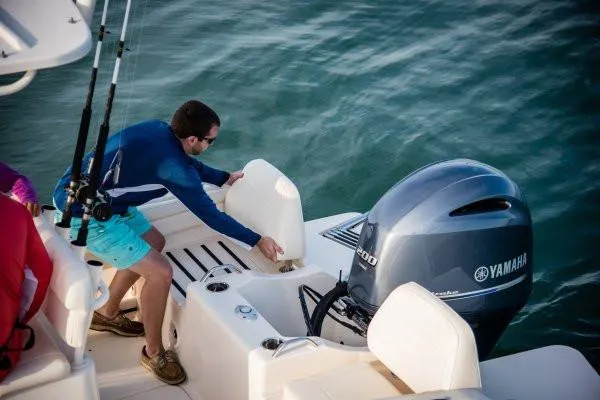 Slide: The Image of Manufacturer Provided Image: 2018 Grady-White Fisherman 216 boat on water with person adjusting seating. - 9