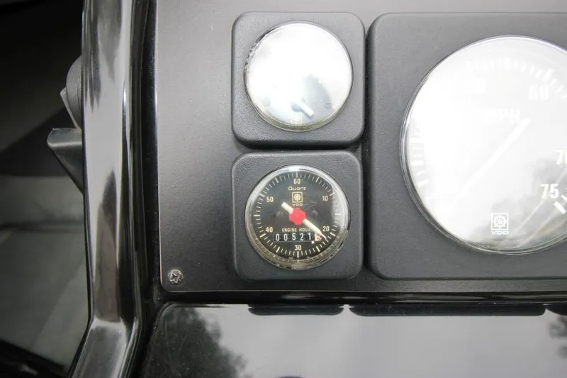 Slide: The Image of Dashboard of 1989 Formula 223 SS boat with engine hour meter and speedometer. - 16