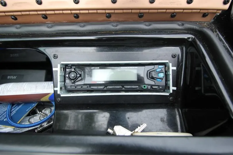 Slide: The Image of Marine stereo system in a 1989 Formula 223 SS boat dashboard. - 21