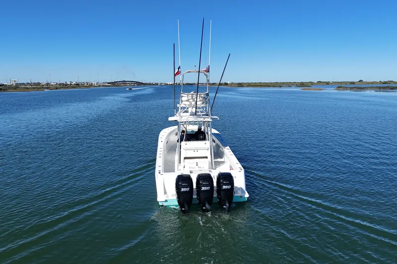 Slide: The Image of 2013 SeaVee 39B Center Console boat cruising on open water. - 19