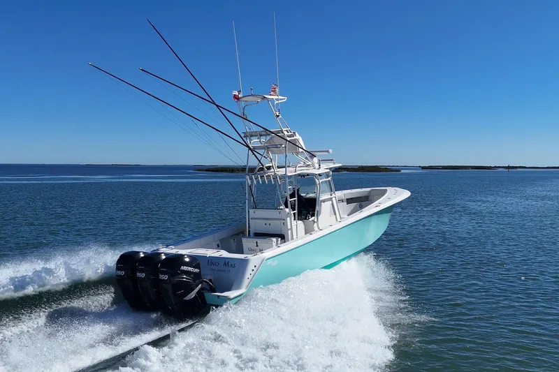 Slide: The Image of 2013 SeaVee 39B Center Console boat cruising on open water. - 7