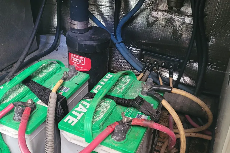 Slide: The Image of Engine room of 2001 Luhrs 34 Convertible with batteries and wiring. - 56