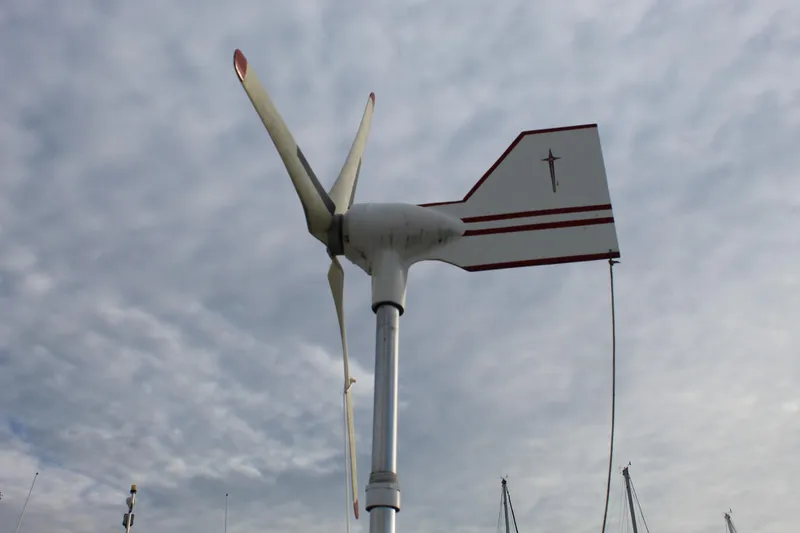 Slide: The Image of Wind turbine against cloudy sky, Spencer Yachts 53, 1979 model. - 58