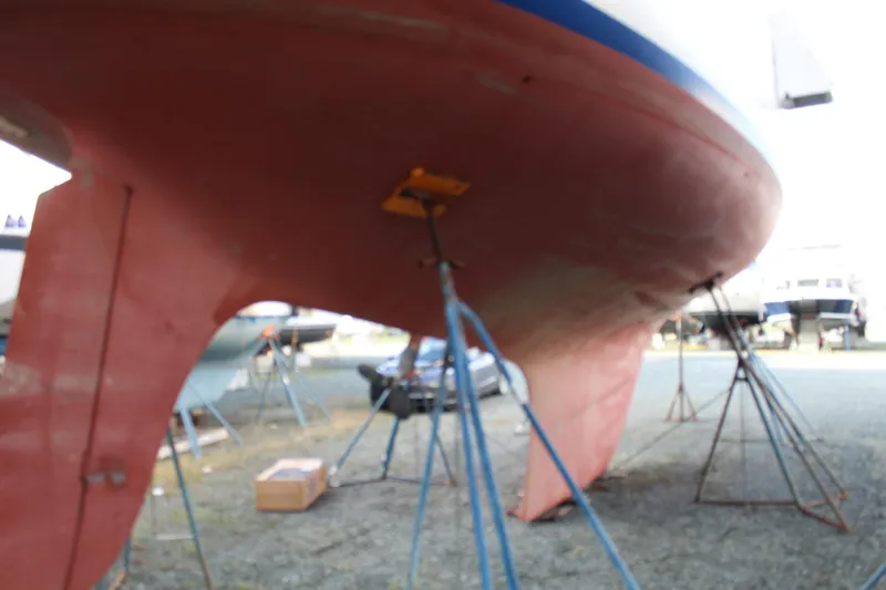 Slide: The Image of 1979 Spencer Yachts 53 hull on stands in a boatyard. - 62