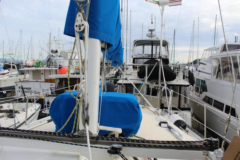 Slide: The Image of 1979 Spencer Yachts 53 sailboat docked among other boats in a marina. - 52