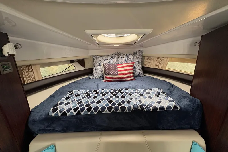 Slide: The Image of Luxurious cabin interior of 2018 Monterey 335 Sport Yacht with cozy bedding. - 15