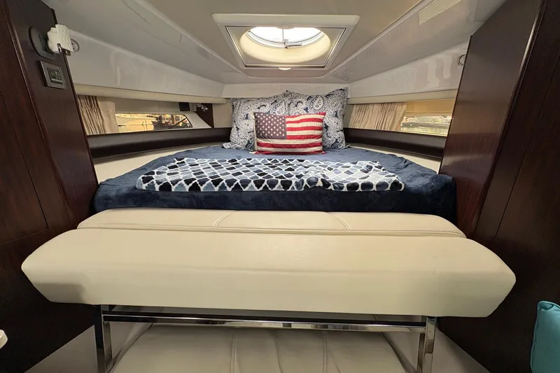 Slide: The Image of Luxurious cabin interior of 2018 Monterey 335 Sport Yacht with stylish bedding and decor. - 16