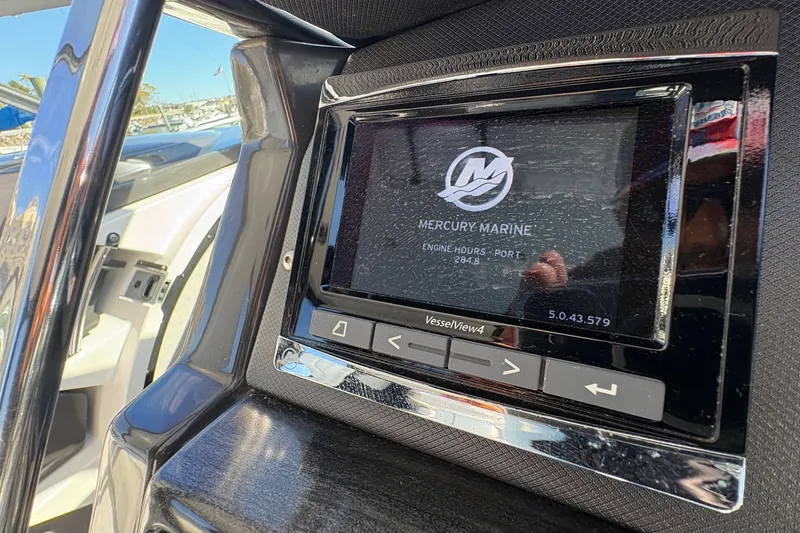 Slide: The Image of Display screen on 2018 Monterey 335 Sport Yacht showing Mercury Marine engine hours. - 23