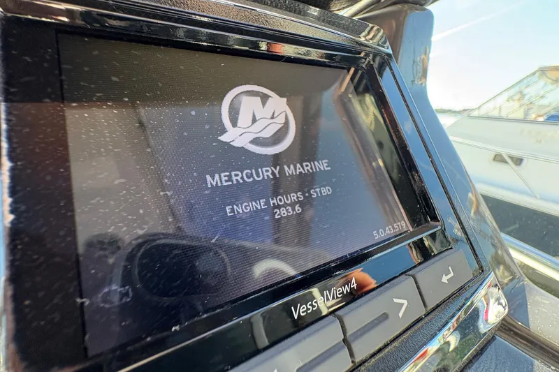 Slide: The Image of Mercury Marine engine display on 2018 Monterey 335 Sport Yacht showing 283.6 hours. - 24