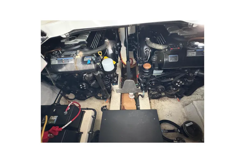 Slide: The Image of Engine compartment of a 2018 Monterey 335 Sport Yacht, showcasing dual engines and components. - 26