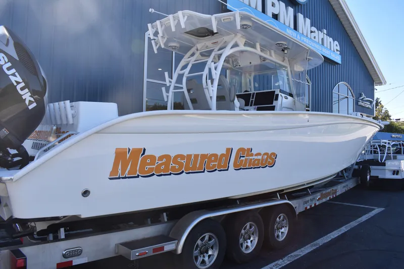 Slide: The Image of 2021 Cape Horn 36 XS boat "Measured Chaos" on trailer at MPM Marine dealership. - 1
