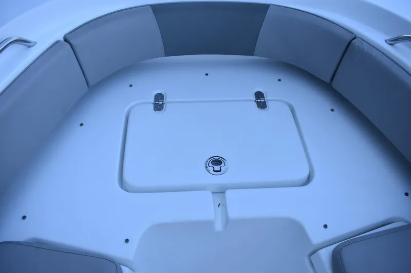 Slide: The Image of 2021 Cape Horn 36 XS boat interior with cushioned seating and storage compartment. - 14